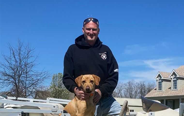 Marine Pest Control Owner and his dog